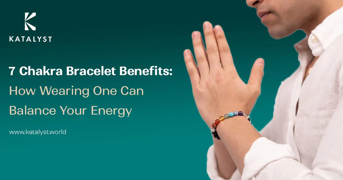A man wearing a 7 chakra bracelet joins his hands in a meditative pose, symbolizing balance, energy healing, and spiritual well-being.