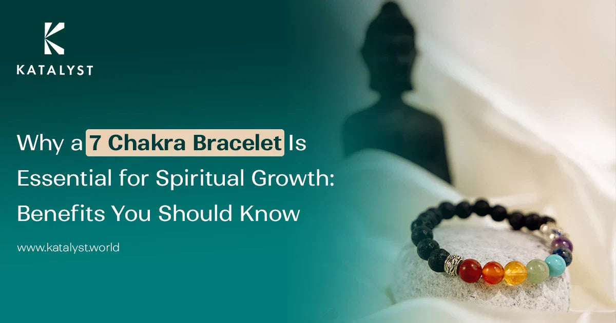 7 Chakra Bracelet with healing crystals for spiritual growth and energy balance, placed on a stone with a Buddha statue in the background.